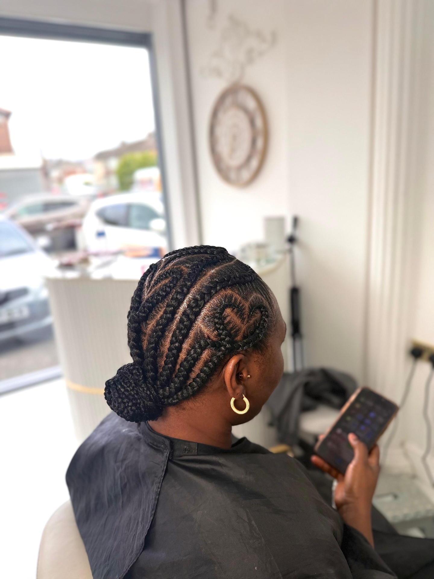 Heart-Design Stitch Cornrows into Low Bun